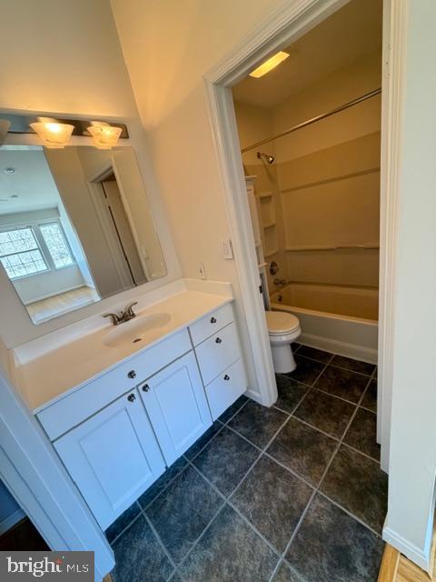 8399 Montgomery Run Road, Unit I Ellicott City, MD 21043 - Photo 20 of 26 a bathroom with a toilet and a sink