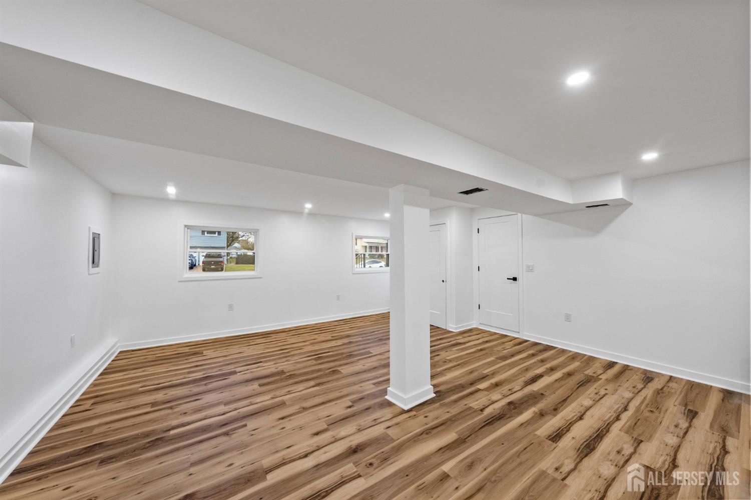 12 Barker Road Somerset, NJ 08873 - Photo 23 of 43 a view of empty room with wooden floor
