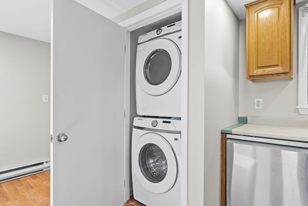 9 Home Avenue, Unit 2 Natick, MA 01760 - Photo 3 of 19 a utility room with dryer and washer