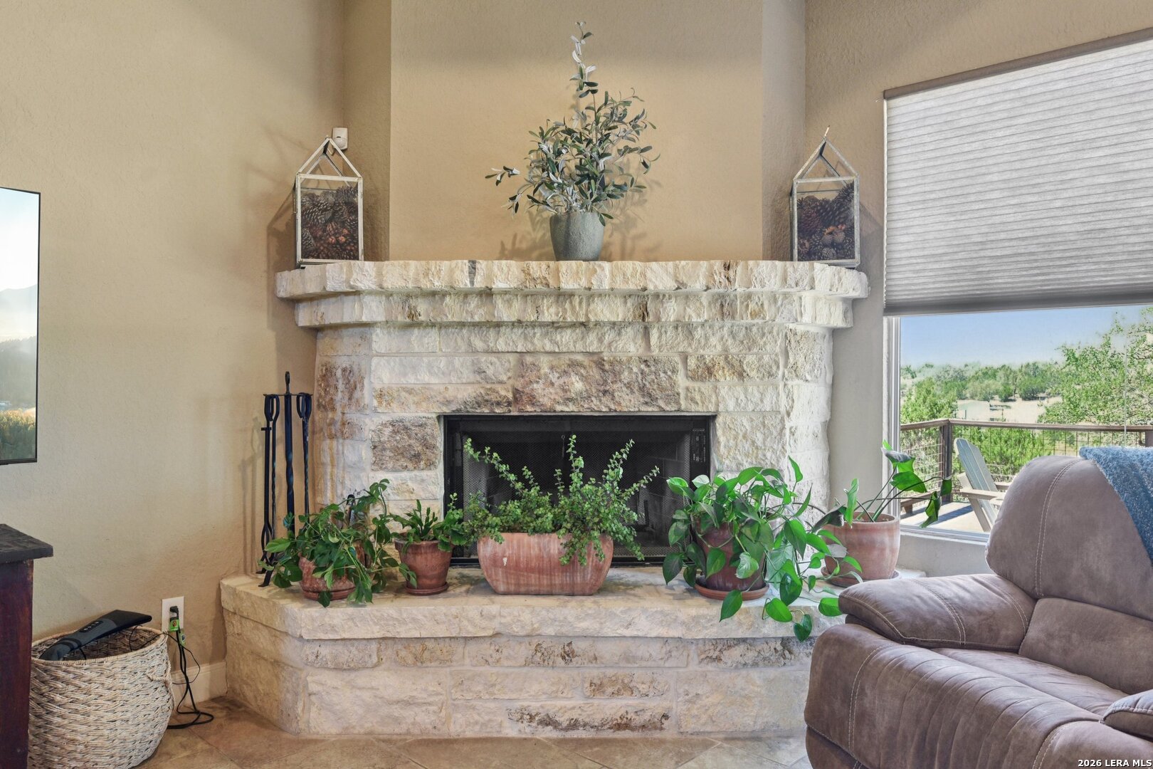 345 Ridge Point Spring Branch, TX 78070 - Photo 11 of 48 a living room with furniture and a fireplace