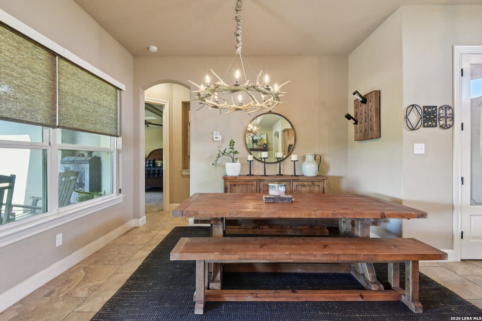 345 Ridge Point Spring Branch, TX 78070 - Photo 13 of 48 a view of a dining room with furniture and a chandelier