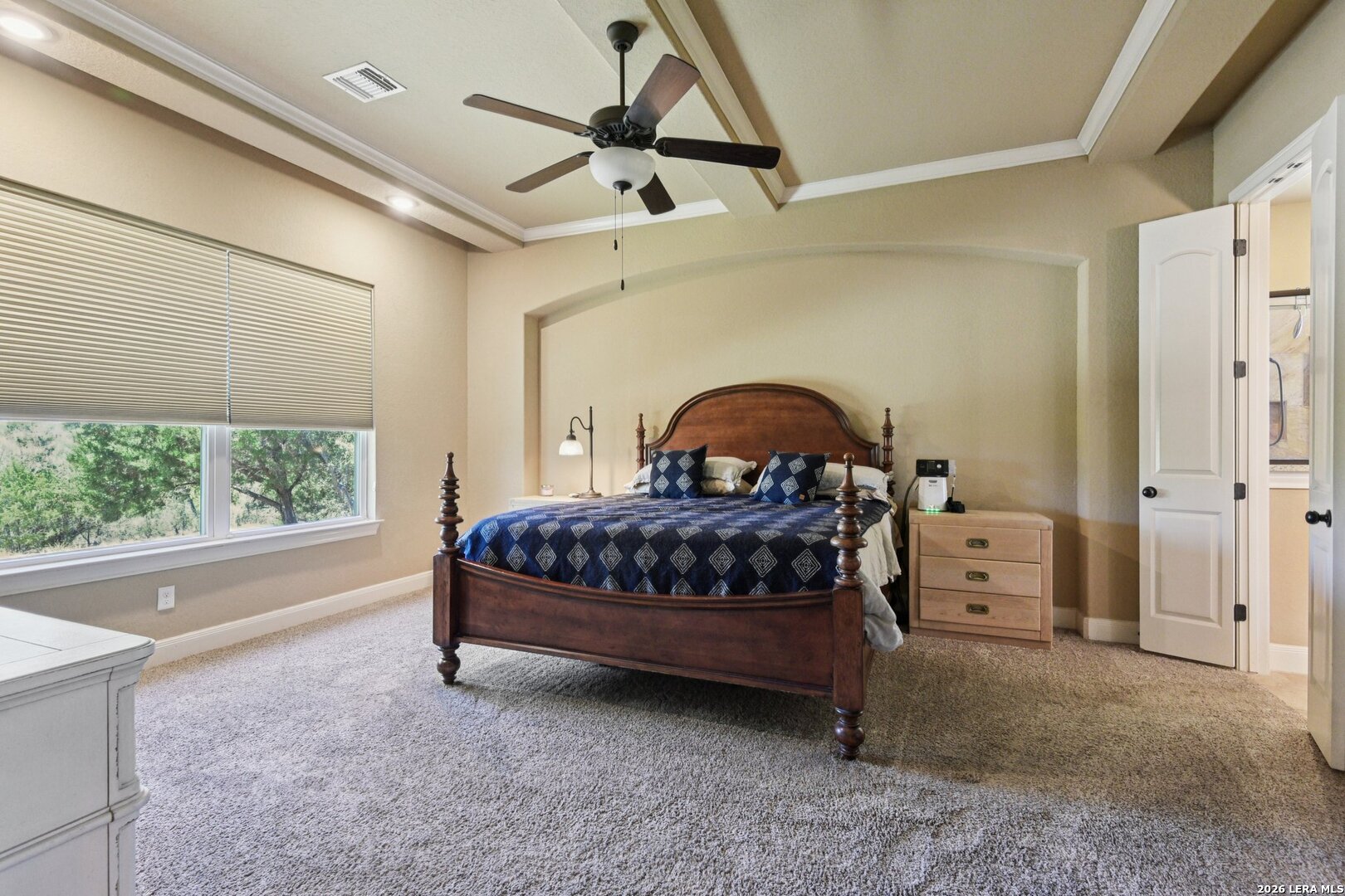 345 Ridge Point Spring Branch, TX 78070 - Photo 19 of 48 a bedroom with a bed and a large window