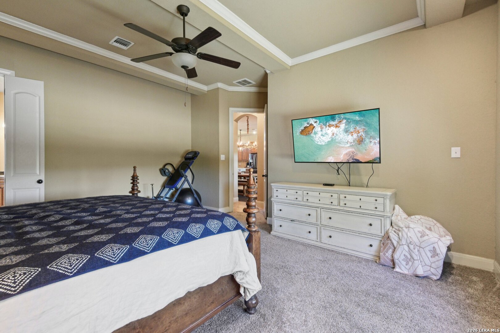 345 Ridge Point Spring Branch, TX 78070 - Photo 21 of 48 a bedroom with a bed and a flat tv screen on dresser
