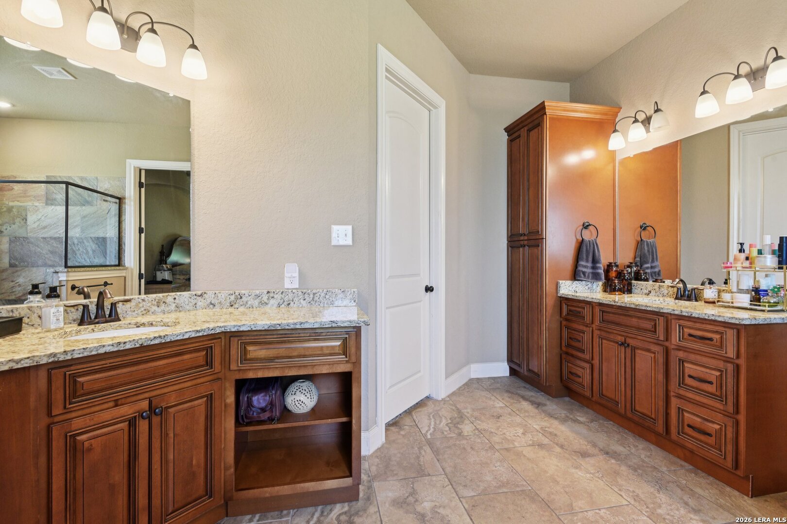 345 Ridge Point Spring Branch, TX 78070 - Photo 24 of 48 a bathroom with a granite countertop double vanity sink and a mirror