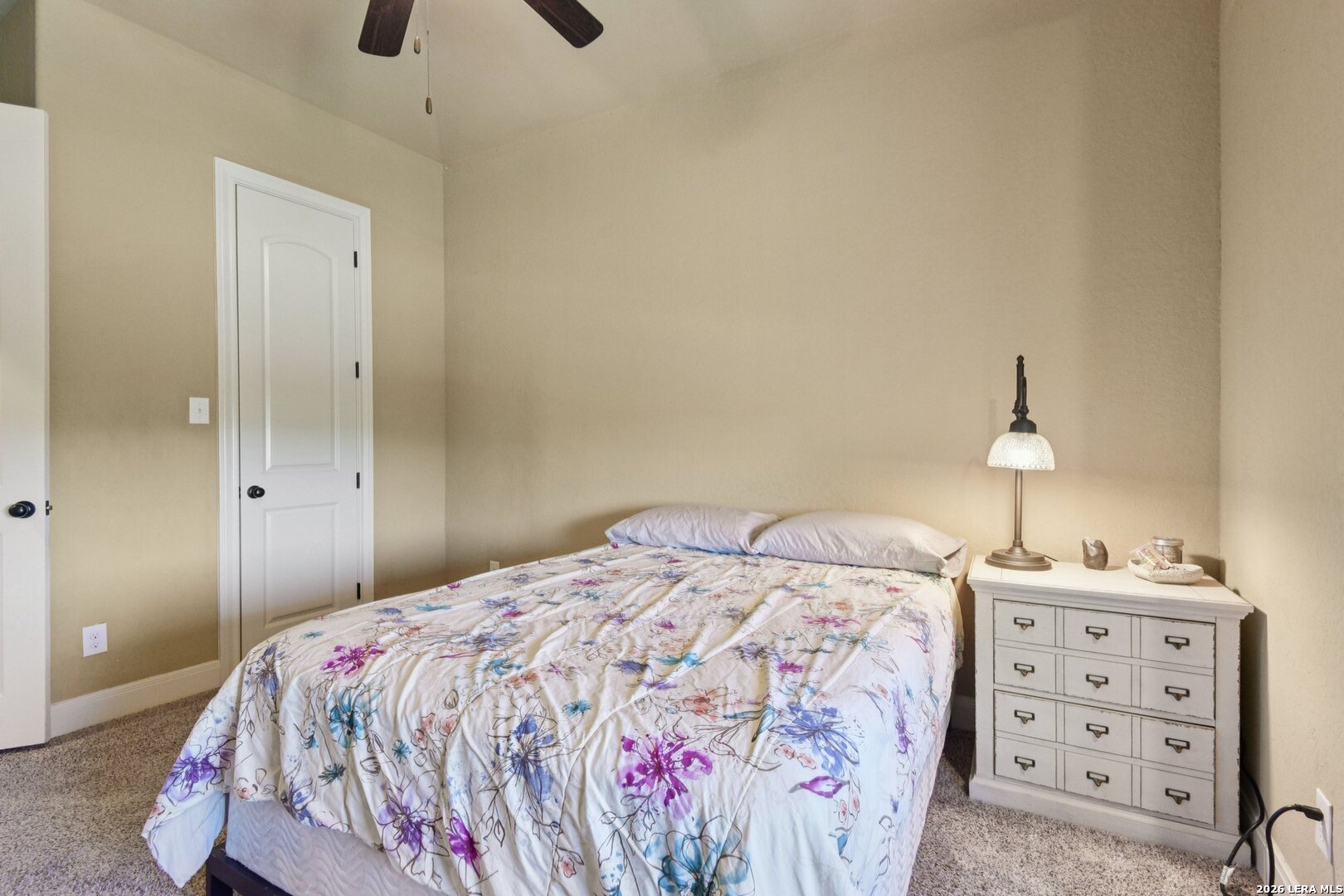 345 Ridge Point Spring Branch, TX 78070 - Photo 35 of 48 a bedroom with a bed and a view of bathroom