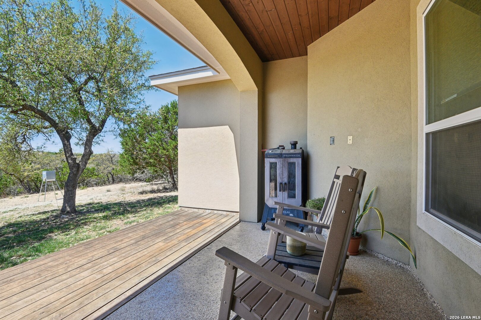 345 Ridge Point Spring Branch, TX 78070 - Photo 39 of 48 a view of a backyard with chairs