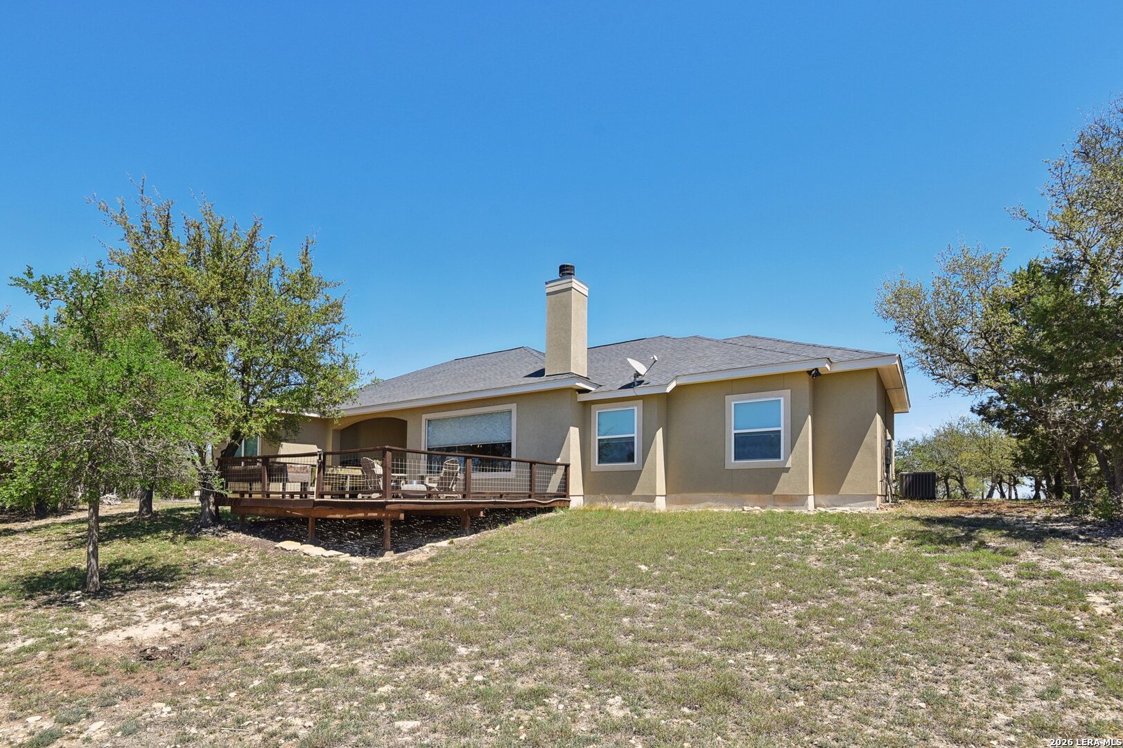 345 Ridge Point Spring Branch, TX 78070 - Photo 42 of 48 a front view of a house with a yard