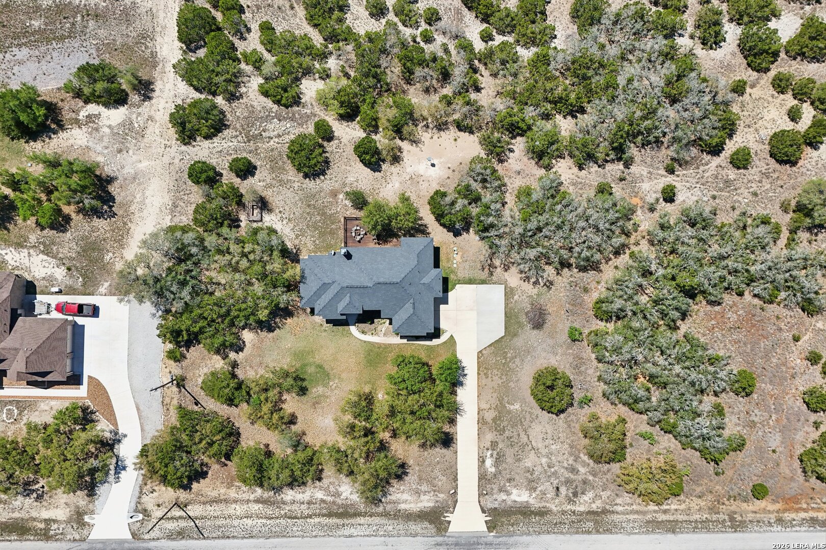 345 Ridge Point Spring Branch, TX 78070 - Photo 46 of 48 an aerial view of a house with a yard and tree s