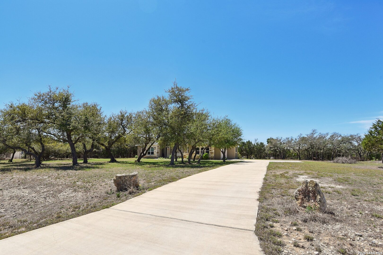 345 Ridge Point Spring Branch, TX 78070 - Photo 5 of 48 a view of outdoor space with deck and yard