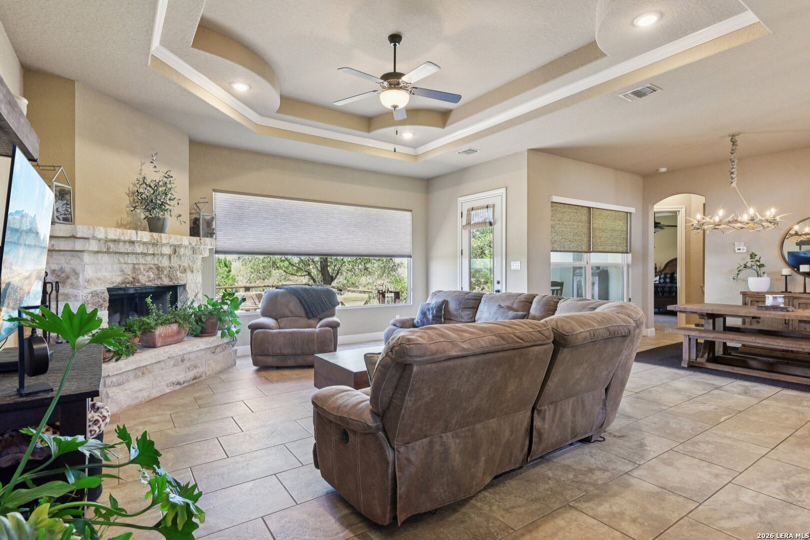 345 Ridge Point Spring Branch, TX 78070 - Photo 7 of 48 a living room with furniture and a fireplace