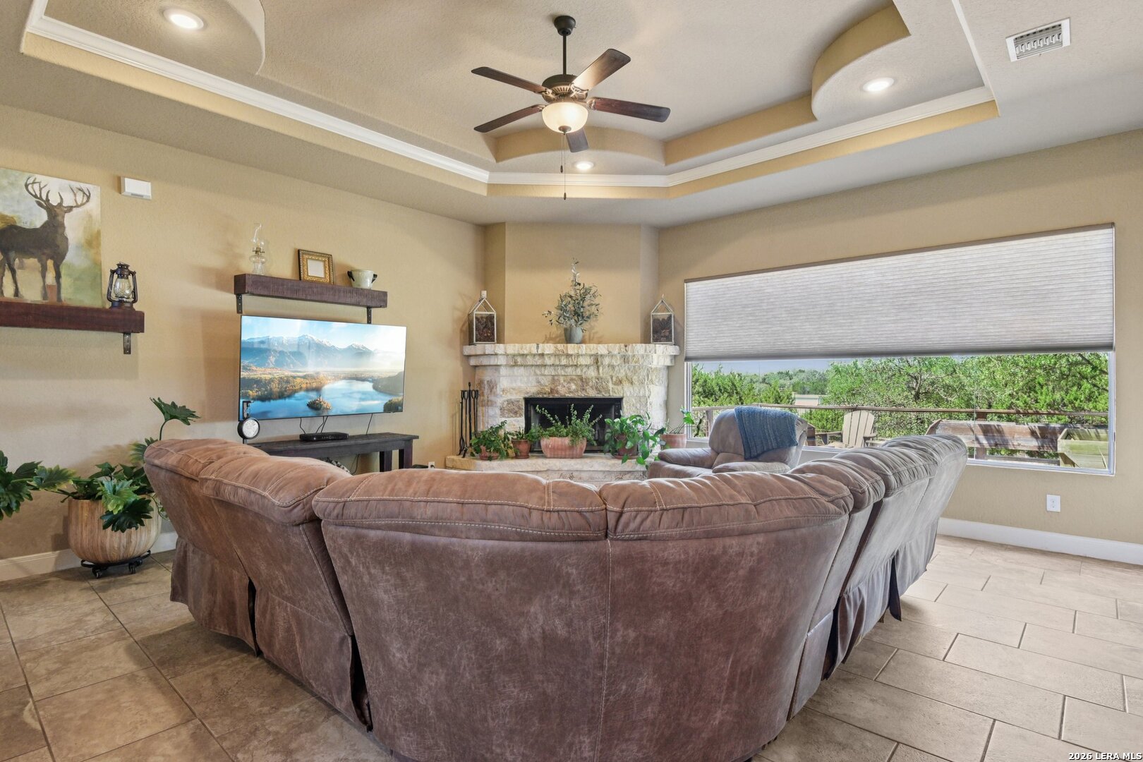 345 Ridge Point Spring Branch, TX 78070 - Photo 8 of 48 a living room with furniture and a fireplace