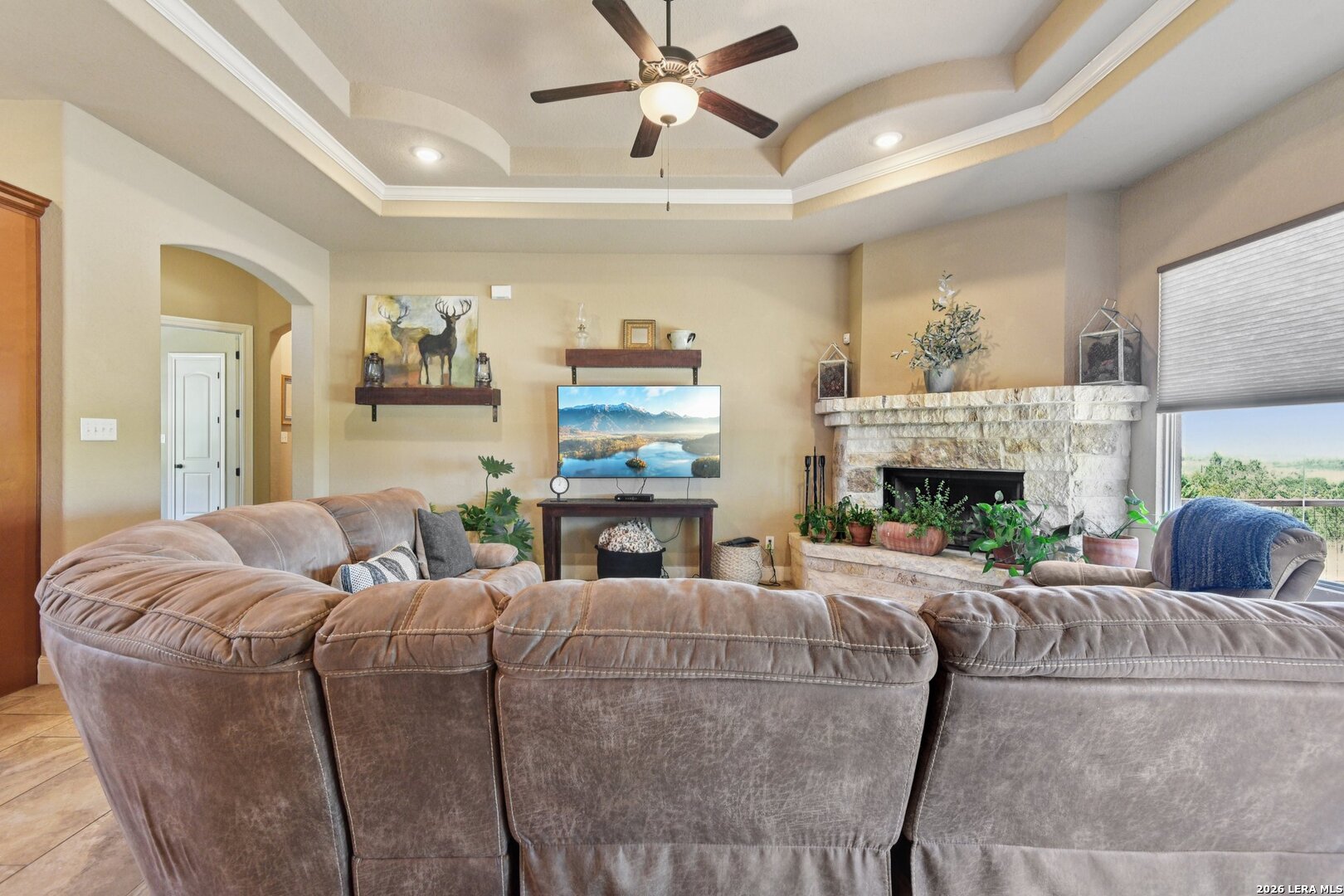 345 Ridge Point Spring Branch, TX 78070 - Photo 10 of 48 a living room with furniture and a fireplace