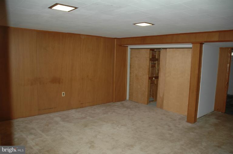 4170 Crest Heights Road Baltimore, MD 21215 - Photo 2 of 30 an empty room with closet area