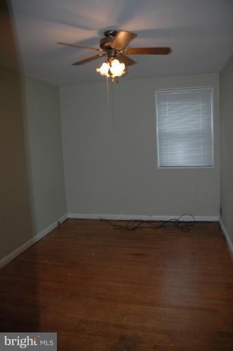 4170 Crest Heights Road Baltimore, MD 21215 - Photo 17 of 30 a view of an empty room with a window