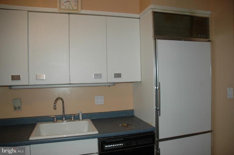4170 Crest Heights Road Baltimore, MD 21215 - Photo 5 of 30 a close view of a sink and a cabinet in the kitchen