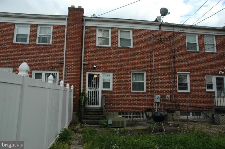 4170 Crest Heights Road Baltimore, MD 21215 - Photo 6 of 30 a brick building that has a lots of windows in it