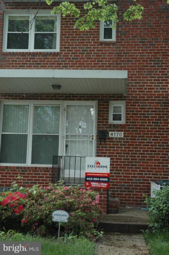 4170 Crest Heights Road Baltimore, MD 21215 - Photo 10 of 30 a view of a house with a yard