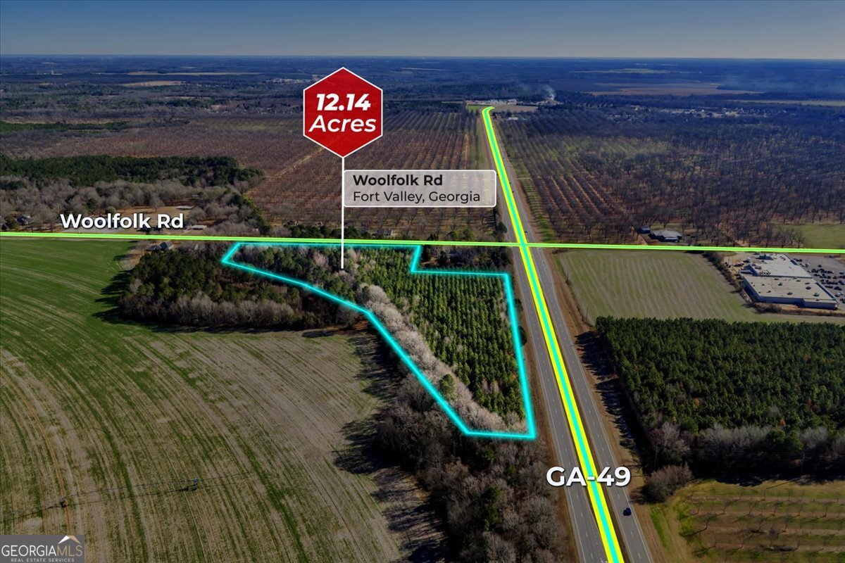 a sign broad on the side of the road