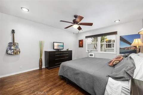 a bed room with a bed and a window