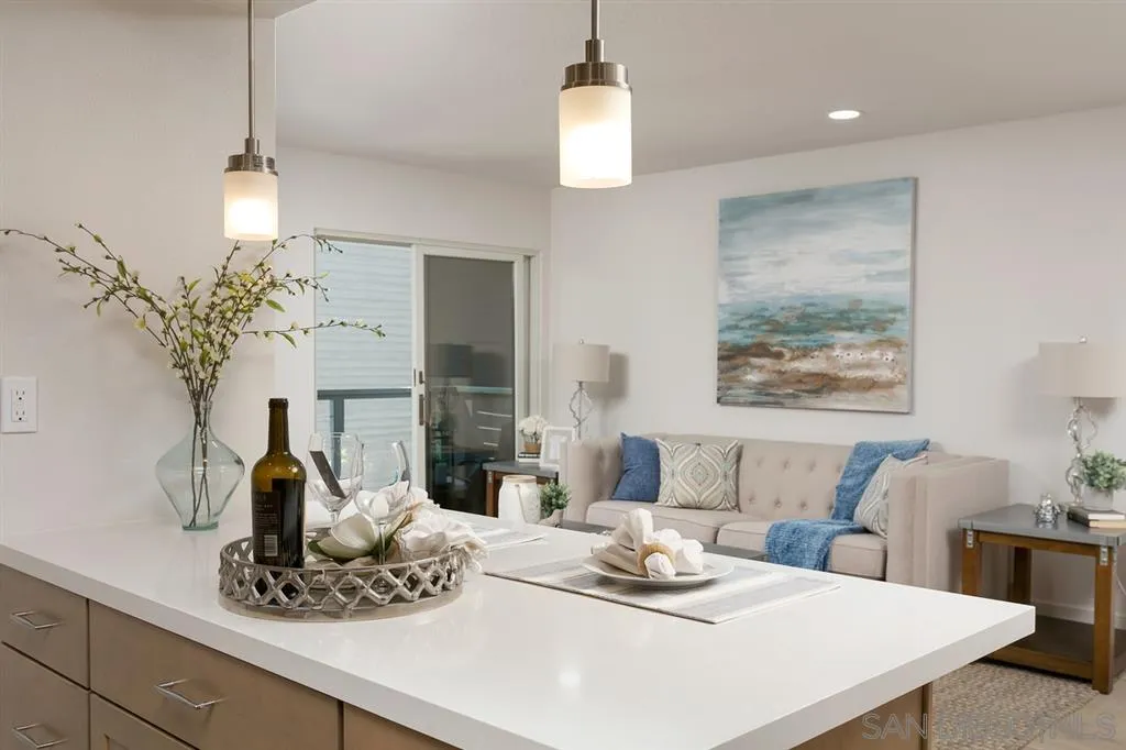 940 Sealane Drive, Unit 6 Encinitas, CA 92024 - Photo 12 of 24 a dining room with furniture and wooden floor