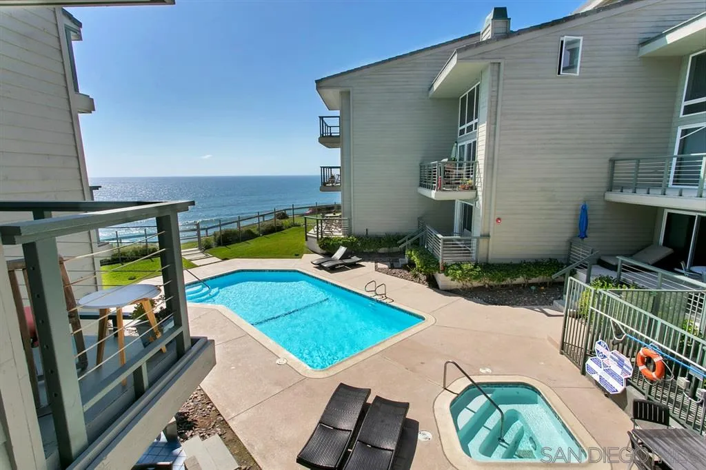 940 Sealane Drive, Unit 6 Encinitas, CA 92024 - Photo 16 of 24 a view of a swimming pool with a patio