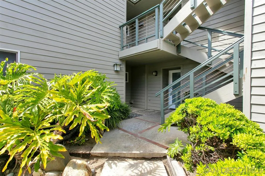 940 Sealane Drive, Unit 6 Encinitas, CA 92024 - Photo 24 of 24 a front view of a house with a yard