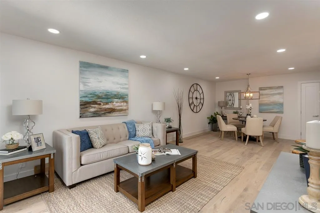 940 Sealane Drive, Unit 6 Encinitas, CA 92024 - Photo 8 of 24 a living room with furniture and a clock