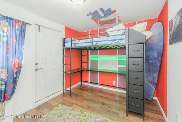 a view of a room with window and stairs