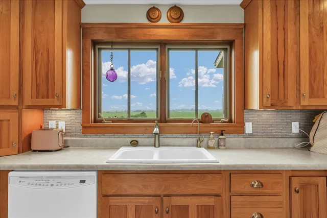a bathroom with a sink a vanity and a mirror
