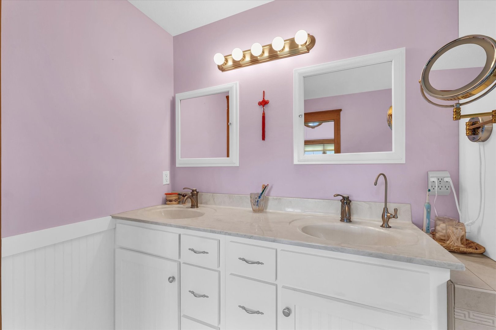 647 County Farm Road Monticello, IL 61856 - Photo 27 of 74 a bathroom with a sink a vanity and a mirror