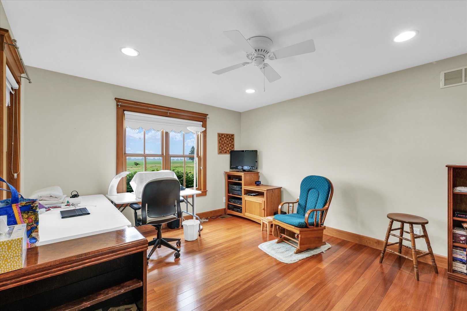 647 County Farm Road Monticello, IL 61856 - Photo 31 of 74 a view of a workspace with furniture and wooden floor