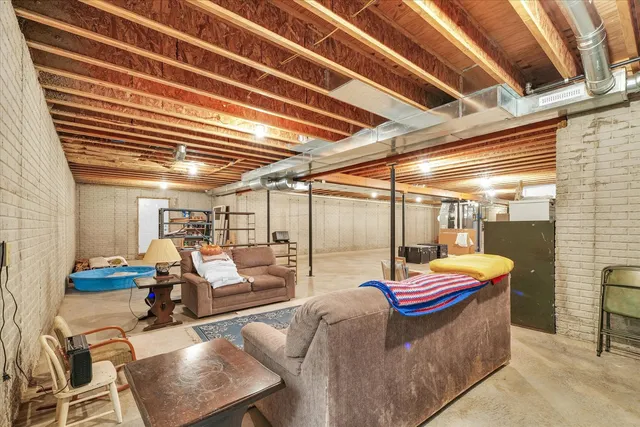 a view of a swimming pool with a yard