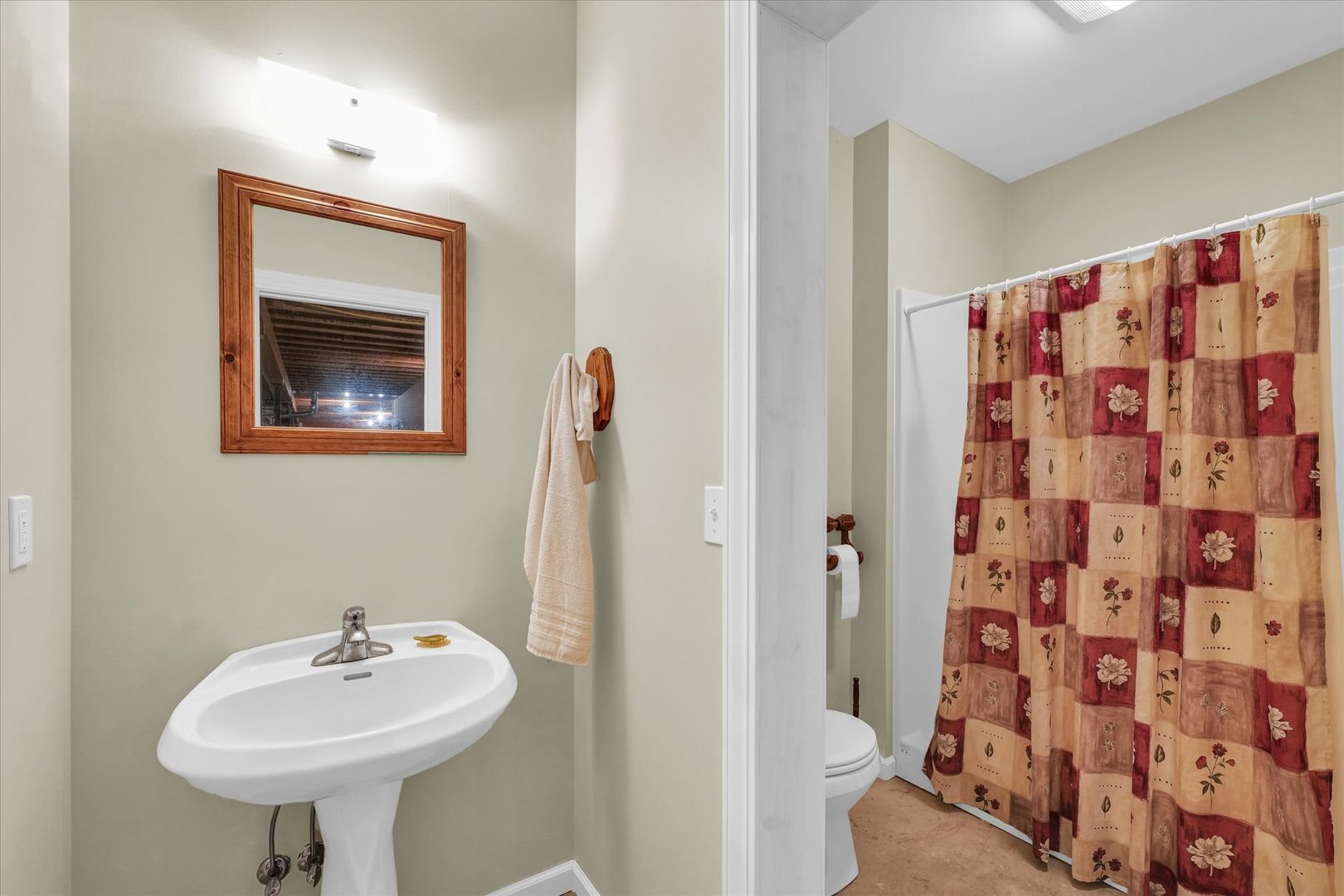 647 County Farm Road Monticello, IL 61856 - Photo 49 of 74 a bathroom with a sink toilet and shower
