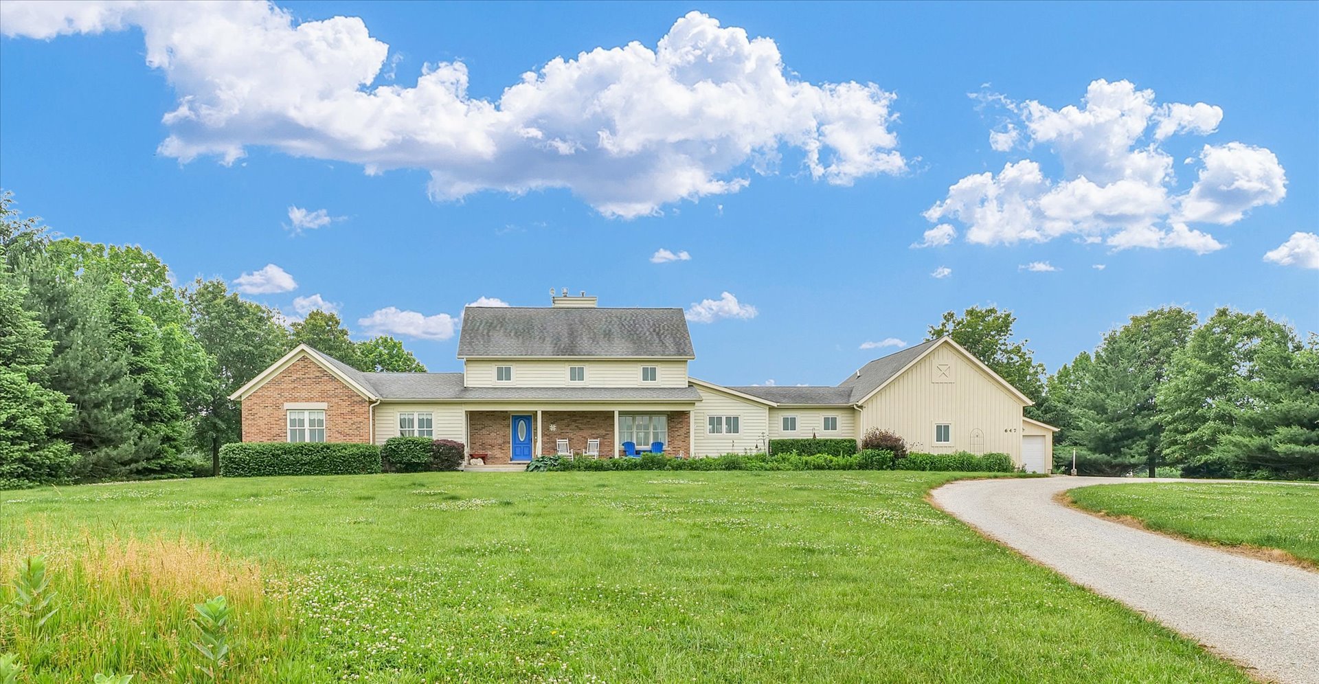 647 County Farm Road Monticello, IL 61856 - Photo 5 of 74 a front view of house with yard and green space