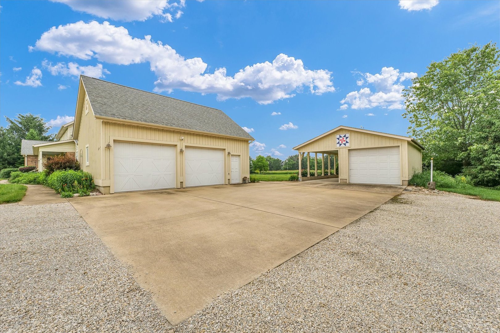 647 County Farm Road Monticello, IL 61856 - Photo 57 of 74 a house view with a garden space