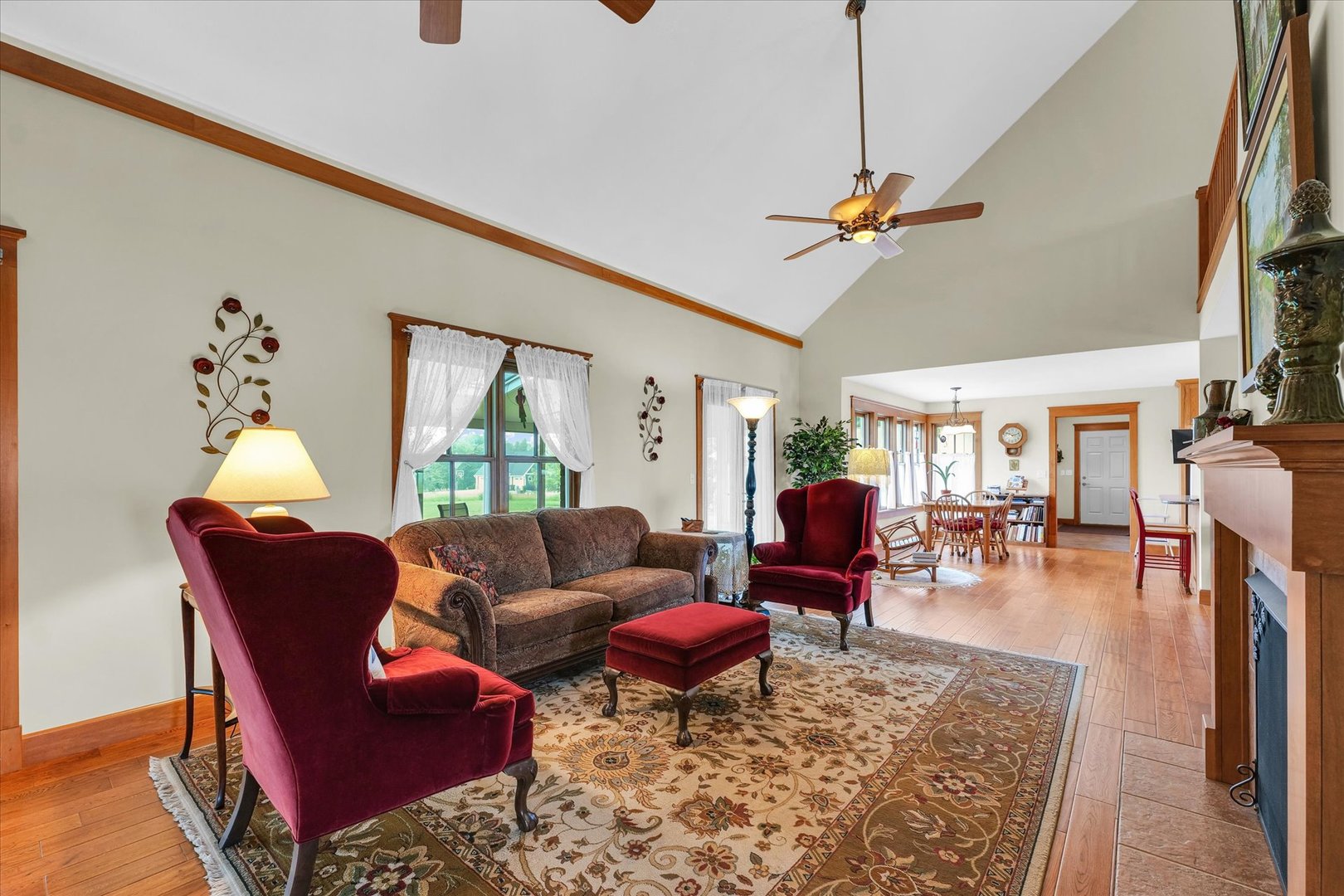647 County Farm Road Monticello, IL 61856 - Photo 9 of 74 a living room with furniture a rug and a chandelier