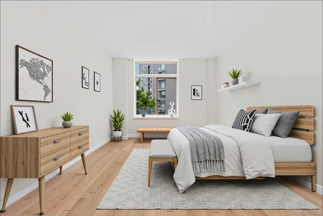 a bedroom with a bed and a couch