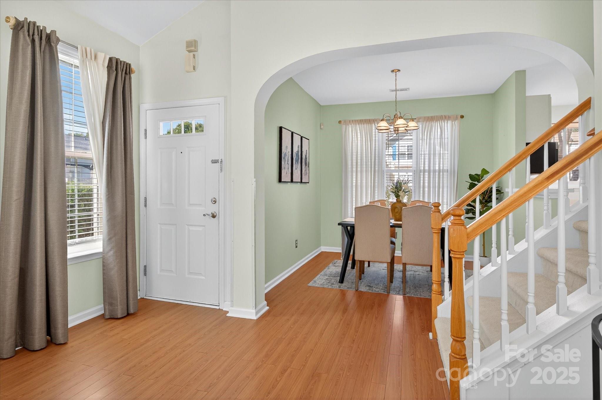 1119 Sienna Sand Way Fort Mill, SC 29708 - Photo 3 of 36 a furnished livingroom with a window and wooden floor