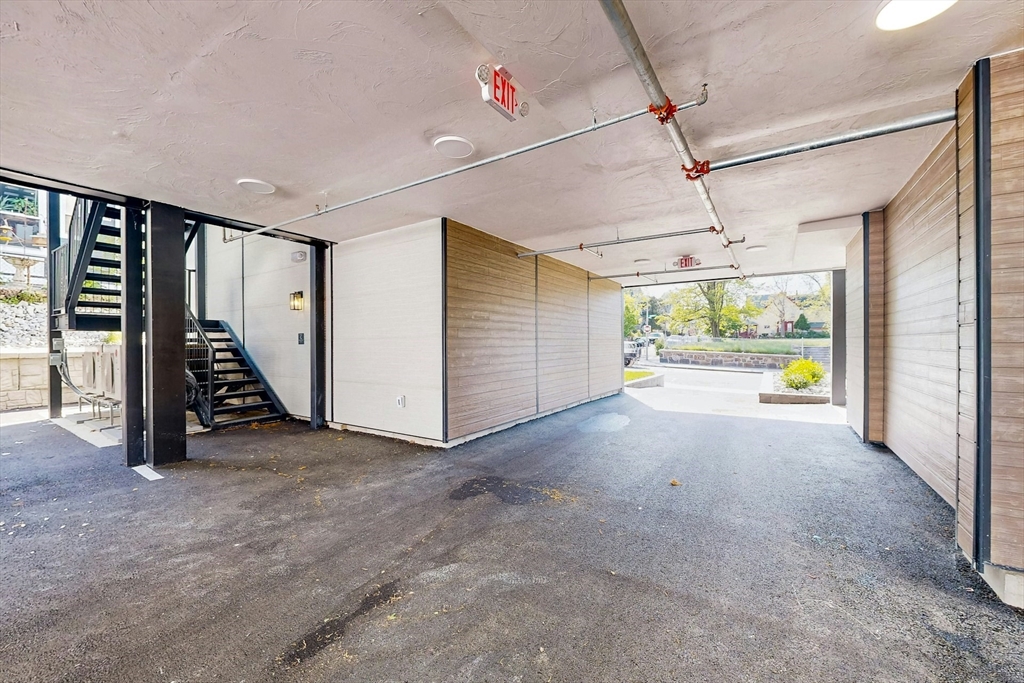 476 Warren Street Boston, MA 02121 - Photo 4 of 29 a view of an empty room with a window