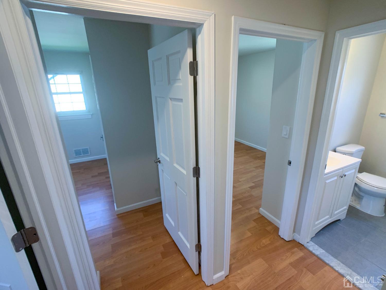 2 Darrell Court Edison, NJ 08817 - Photo 11 of 25 a view of a bathroom from a hallway