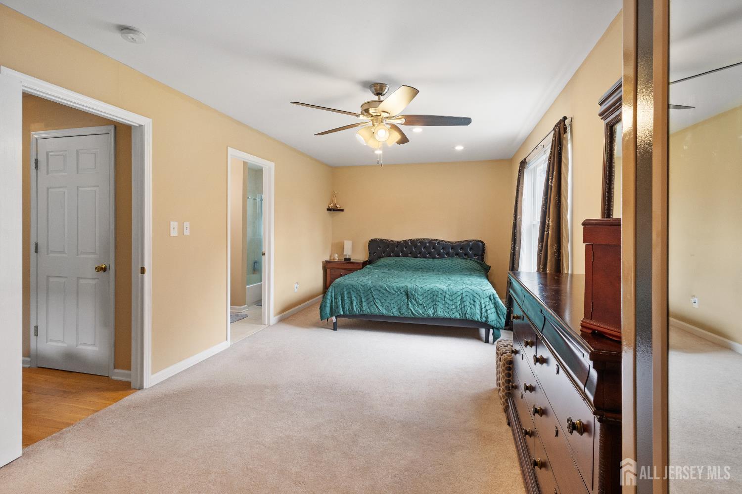 1740 Holly Road North Brunswick, NJ 08902 - Photo 15 of 32 a view of a hallway to a hallway with a bedroom
