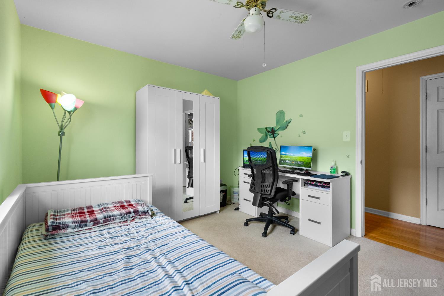 1740 Holly Road North Brunswick, NJ 08902 - Photo 19 of 32 a view of a room with gym equipment