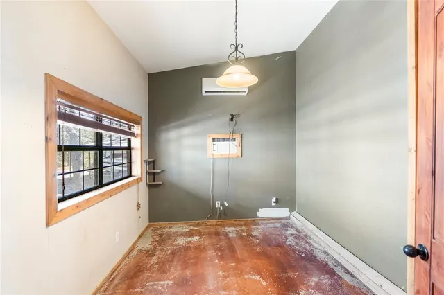 a view of a room with a large window