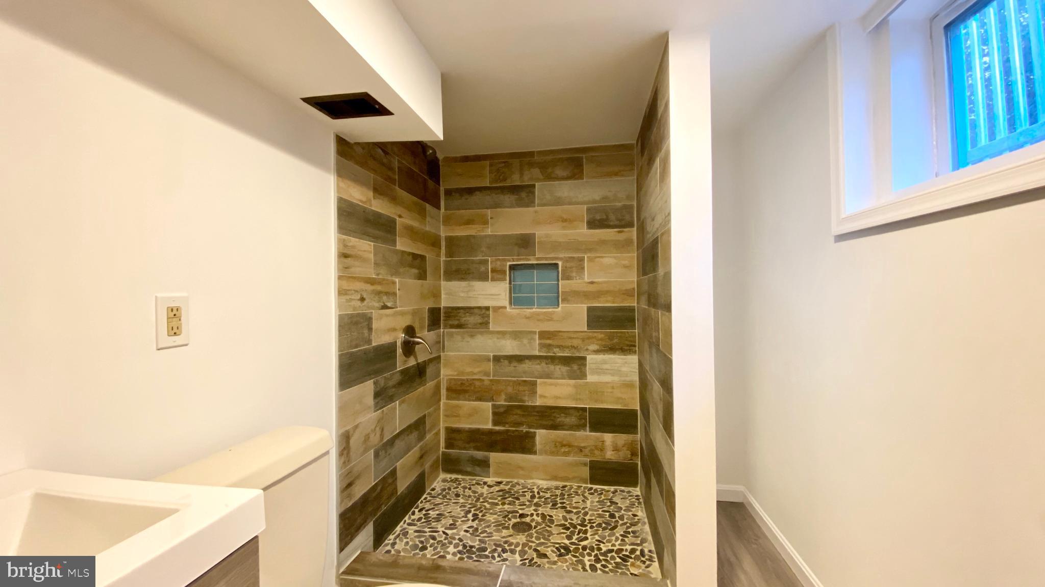 3533 Edwin Street Silver Spring, MD 20902 - Photo 11 of 20 Renovated fulll bath in basement