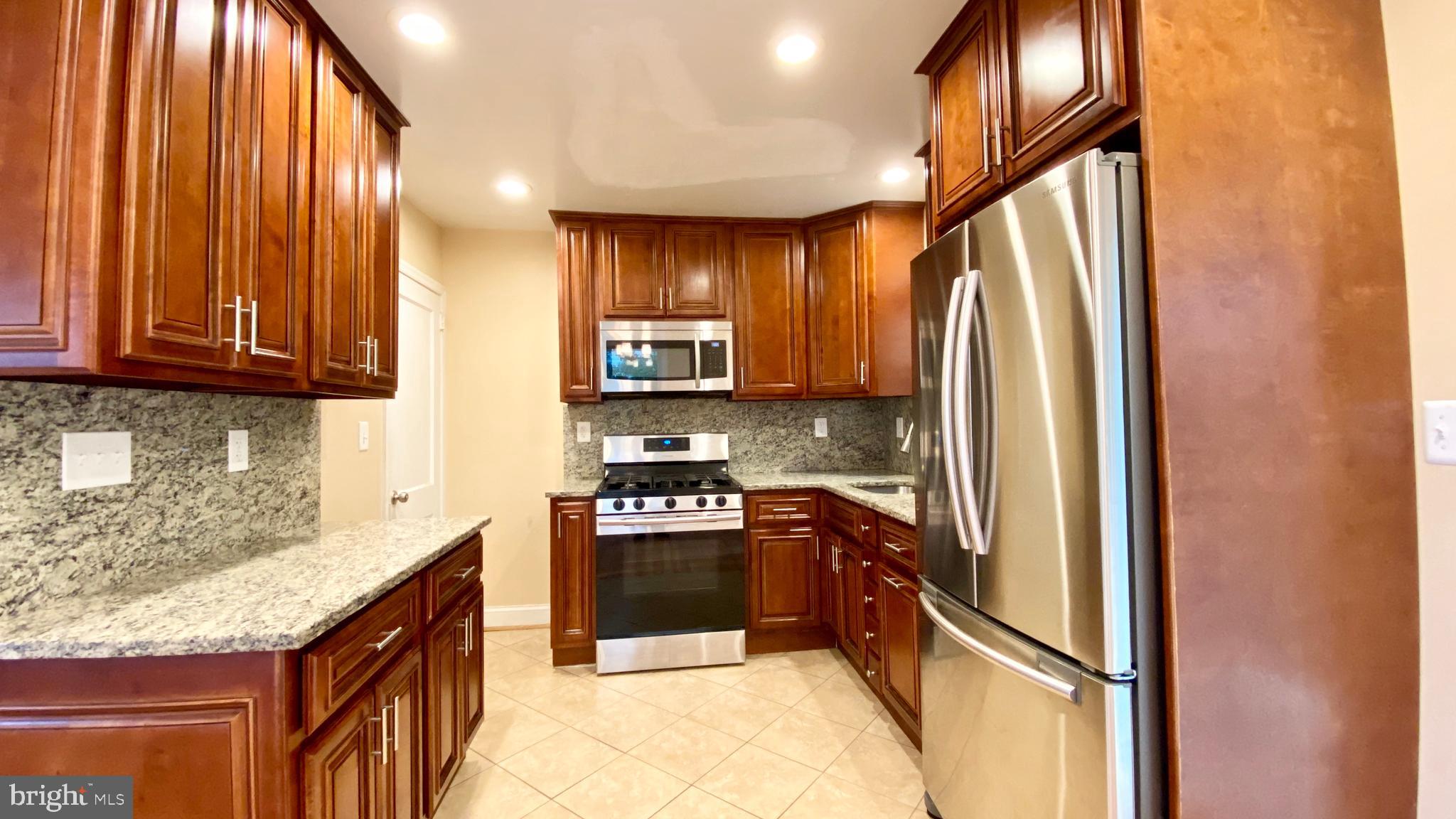3533 Edwin Street Silver Spring, MD 20902 - Photo 5 of 20 Kitchen with stainless appliances