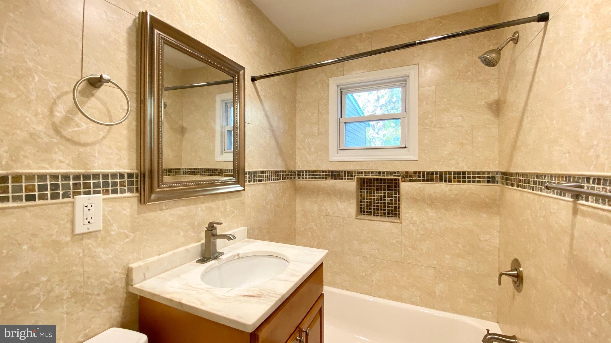 3533 Edwin Street Silver Spring, MD 20902 - Photo 9 of 20 Hall full bathroom upstairs