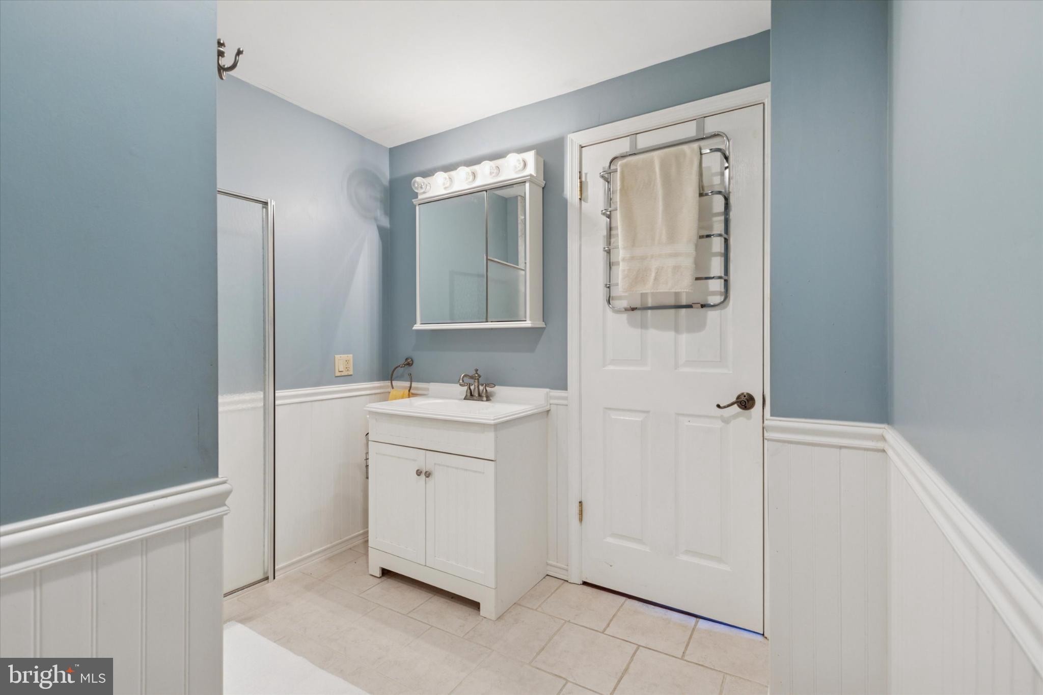 1500 Allen Road Oreland, PA 19075 - Photo 18 of 49 a bathroom with a sink and a mirror