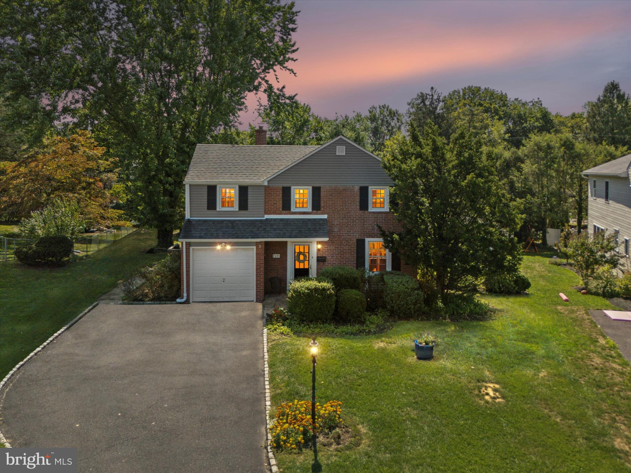 1500 Allen Road Oreland, PA 19075 - Photo 3 of 49 a front view of a house with a yard and trees