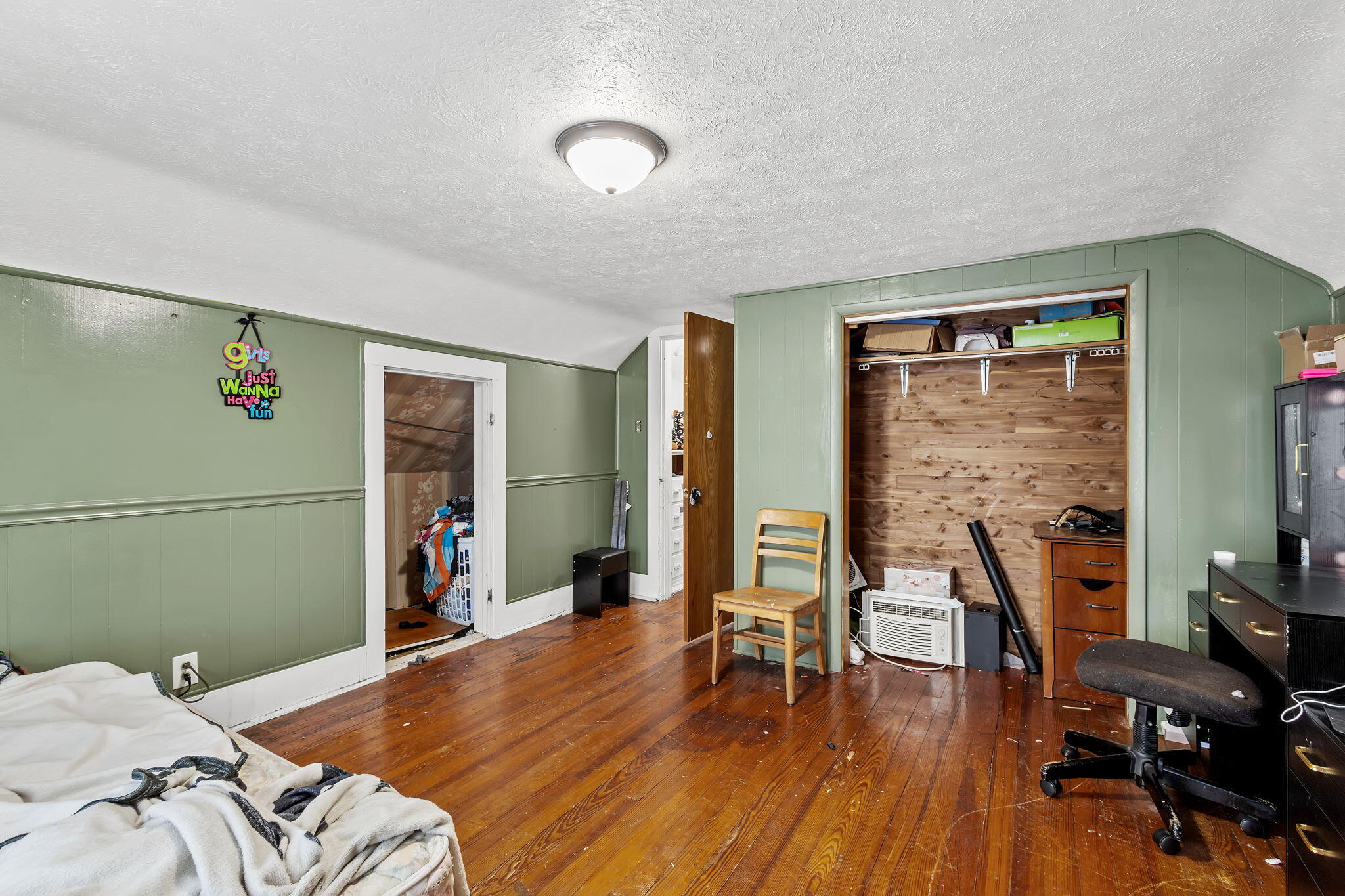 319 East Oak Street Rensselaer, IN 47978 - Photo 20 of 33 a bedroom with furniture and a wooden floor