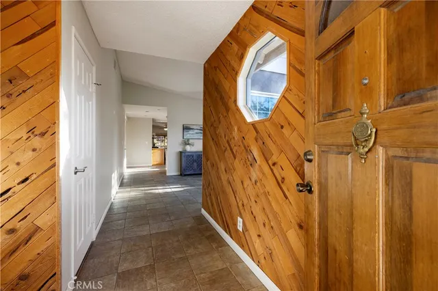 a view of a wooden floor with a bathroom